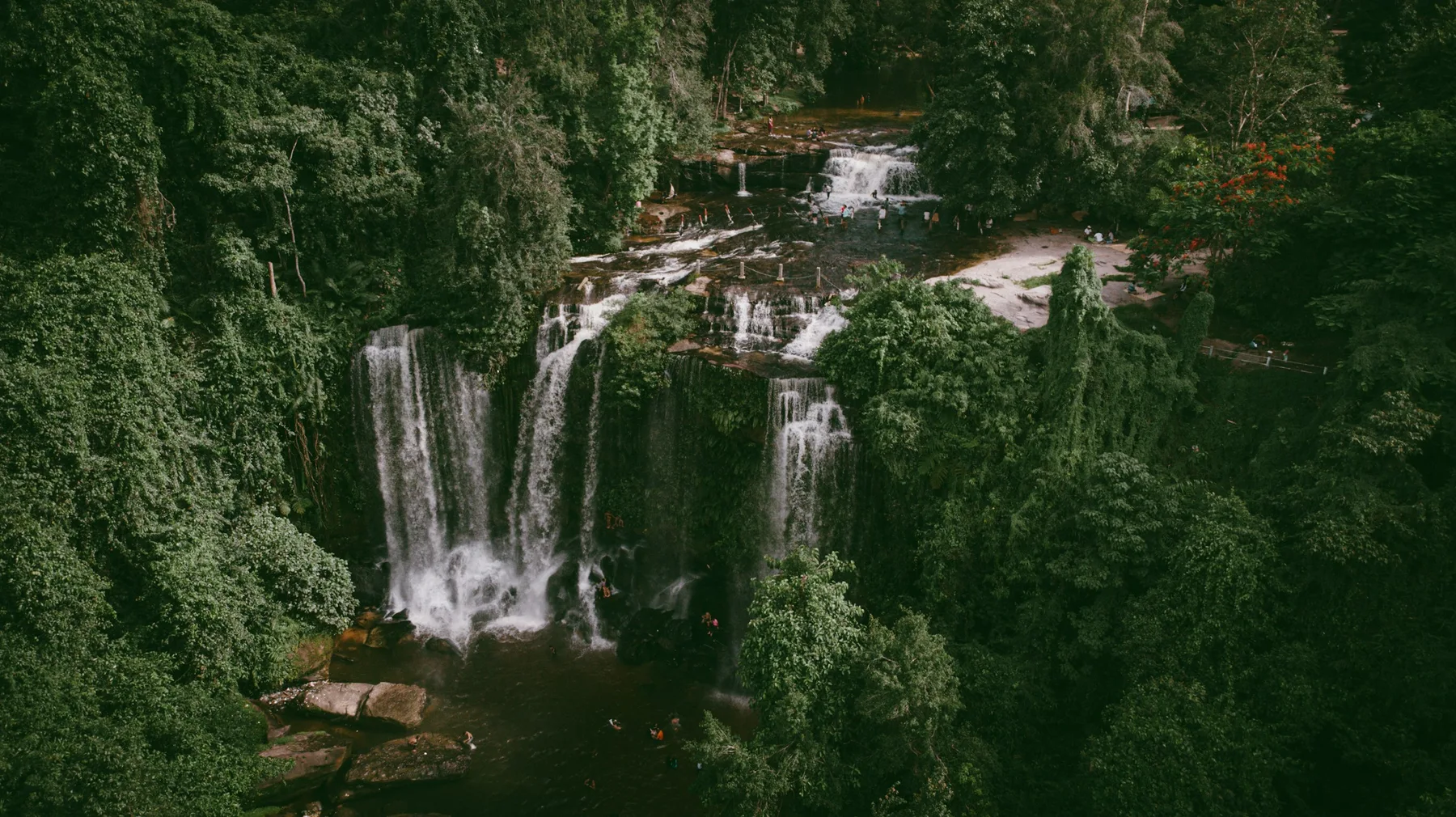 Phnom Kulen waterfall framed by tropical forest